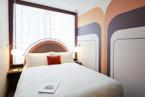 Postel nebo postele na pokoji v ubytování Ovolo South Yarra