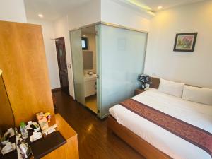Giường trong phòng chung tại Sepon Resort - Cua Viet Beach