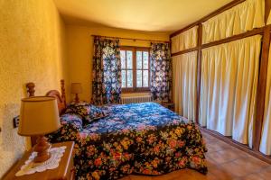 Postel nebo postele na pokoji v ubytování EVA & TRAVEL - El Bosquet de Prades