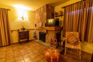 TV a/nebo společenská místnost v ubytování EVA & TRAVEL - El Bosquet de Prades