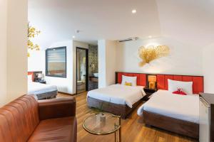 Postelja oz. postelje v sobi nastanitve Hoang Trinh Hotel