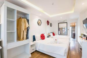 Postelja oz. postelje v sobi nastanitve Hoang Trinh Hotel