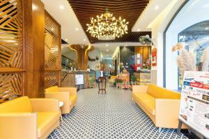 Predel za sedenje v nastanitvi Hoang Trinh Hotel