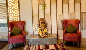 Posezení v ubytování juSTa Palampur Resort & Convention Centre