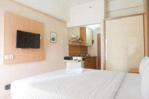 Kuchyň nebo kuchyňský kout v ubytování Best Value Studio Room Apartment at Pavilion Permata By Travelio