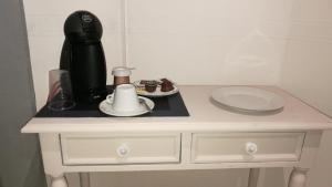 Príslušenstvo na prípravu kávy alebo čaju v ubytovaní Hostal La Campana