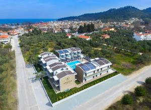 an aerial view of a house with a swimming pool at Anassa Blue Boutique Hotel in Limenas