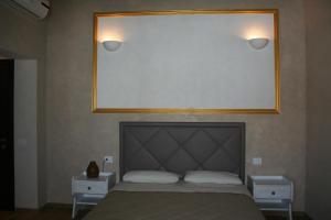 Llit o llits en una habitació de La Villetta Sul Mavone