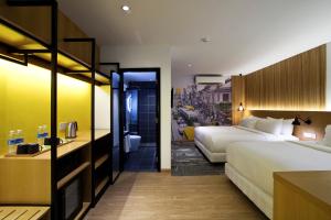 Postel nebo postele na pokoji v ubytování Indie Hotel Kuala Lumpur