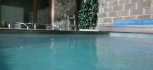 The swimming pool at or close to Banya Guest Rooms 23