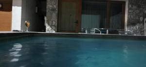 The swimming pool at or close to Banya Guest Rooms 23