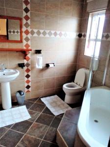 A bathroom at Amarachi a homely experience
