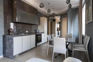 Η κουζίνα ή μικρή κουζίνα στο Hotel "Mandarin Clubhouse"