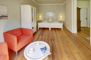 Postel nebo postele na pokoji v ubytování fewo1846 - Am Südermarkt - familienfreundliche Wohnung im Stadtzentrum