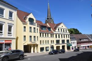 Foto dalla galleria di fewo1846 - Atrium - luxuriöse Wohnung mit 3 Schlafzimmern und Balkon im Stadtzentrum a Flensburgo