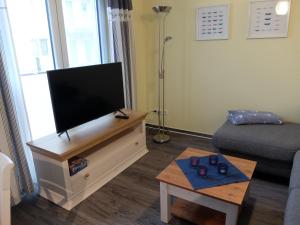 TV a/nebo společenská místnost v ubytování Moorhexe