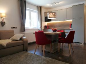 Kuchyň nebo kuchyňský kout v ubytování Appartements Onyx