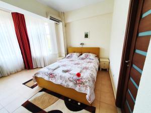 Postel nebo postele na pokoji v ubytování Hotel Florentina