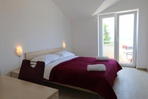 Кровать или кровати в номере Apartments Sucic Iva i Tea