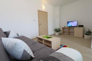 Телевизор и/или развлекательный центр в Apartments Sucic Iva i Tea