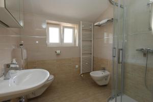 Ванная комната в Apartments Sucic Iva i Tea