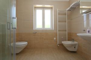 Ванная комната в Apartments Sucic Iva i Tea