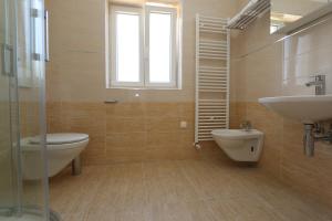 Ванная комната в Apartments Sucic Iva i Tea