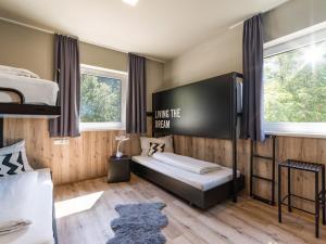 Postel nebo postele na pokoji v ubytování Contiki Haus Schöneck