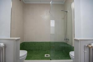 Koupelna v ubytování VILLA DEL RIU