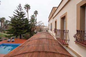 Bazén v ubytování VILLA DEL RIU nebo v jeho okolí