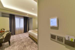 Giường trong phòng chung tại Kare Hotel Sultanahmet