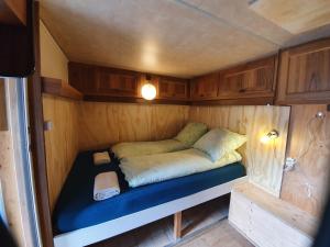 מיטה או מיטות בחדר ב-Hostel Le Chandelier