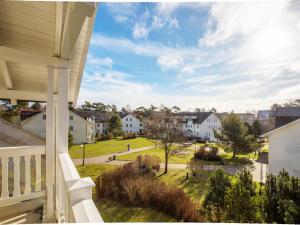 ein Blick vom Balkon eines Hauses in der Unterkunft Dünenpark Binz - Komfort Ferienwohnung mit 1 Schlafzimmer und Balkon im Dachgeschoss 234 in Binz
