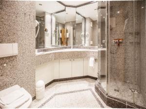 Ein Badezimmer in der Unterkunft Dünenpark Binz - Komfortplus Ferienwohnung mit 1 Schlafzimmer und Balkon im Dachgeschoss 247