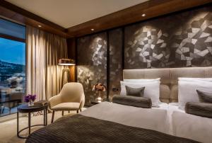 Säng eller sängar i ett rum på Hotel Ambasador - Liburnia