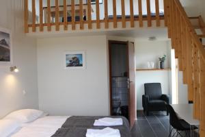 Postel nebo postele na pokoji v ubytování Hótel Á