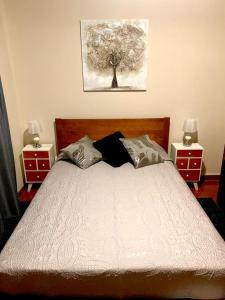 Ένα ή περισσότερα κρεβάτια σε δωμάτιο στο Ninho das Cagarras