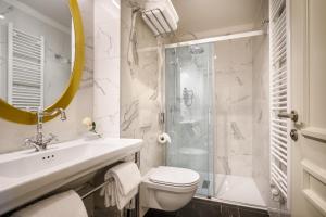 a bathroom with a sink toilet and a shower at Villa Abbazia - by Liburnia Hotels & Villas in Opatija