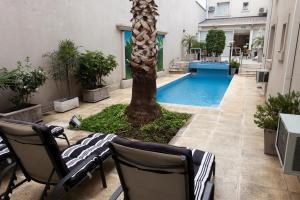 A piscina localizada em Argentino Hotel ou nos arredores