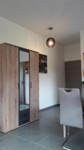 TV a/nebo společenská místnost v ubytování Apartment Am Eck