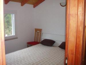 Postel nebo postele na pokoji v ubytování Robinson Style House Zrnovo (3638)