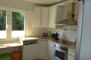 Kuchyň nebo kuchyňský kout v ubytování Ferienhaus Weitblick