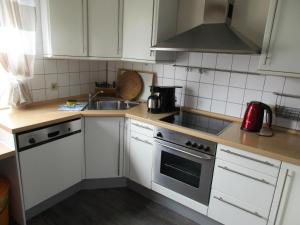 Kuchyň nebo kuchyňský kout v ubytování Ferienhaus Weitblick