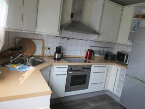 Kuchyň nebo kuchyňský kout v ubytování Ferienhaus Weitblick