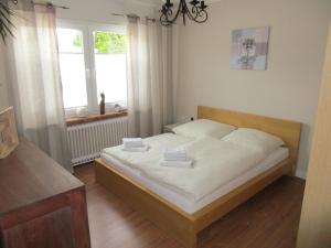 Postel nebo postele na pokoji v ubytování Ferienhaus Weitblick