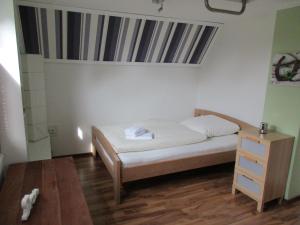 Postel nebo postele na pokoji v ubytování Ferienhaus Weitblick