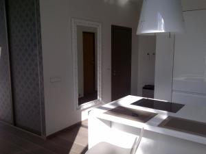 Ένα ή περισσότερα κρεβάτια σε δωμάτιο στο Central Apartment Palanga