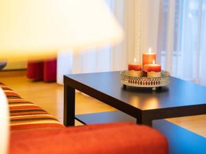 Posezení v ubytování Kaiservillen Heringsdorf - Ferienwohnung mit 1 Schlafzimmer und Balkon D224