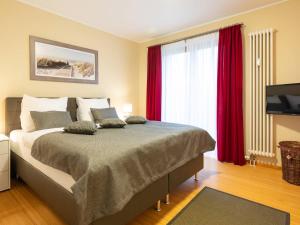 Postel nebo postele na pokoji v ubytování Kaiservillen Heringsdorf - Ferienwohnung mit 1 Schlafzimmer und Balkon D224