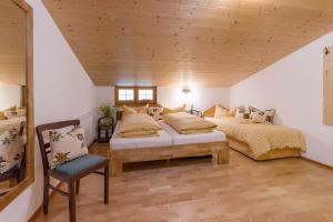 Postel nebo postele na pokoji v ubytování Ferienwohnung Gasteiger